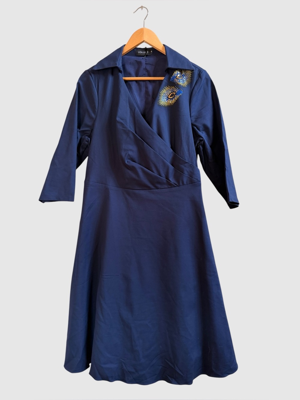 NWT Liza Luxe navy fit & flare dress peacock detail